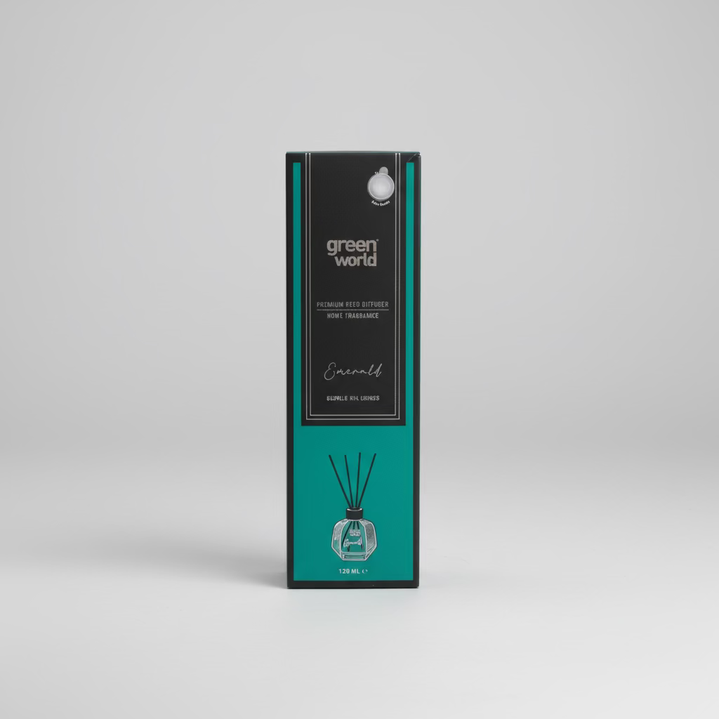 Green World reed diffuser box in 'Enchanted' scent, standing on a wooden surface against a stone wall background.