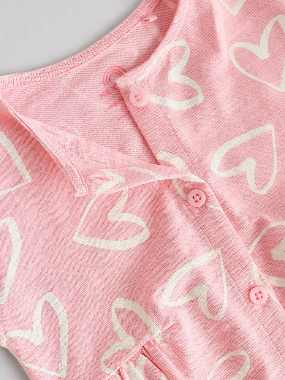 Next Romper/ Bodysuit in Rose , Pitaya and White 6-9 months