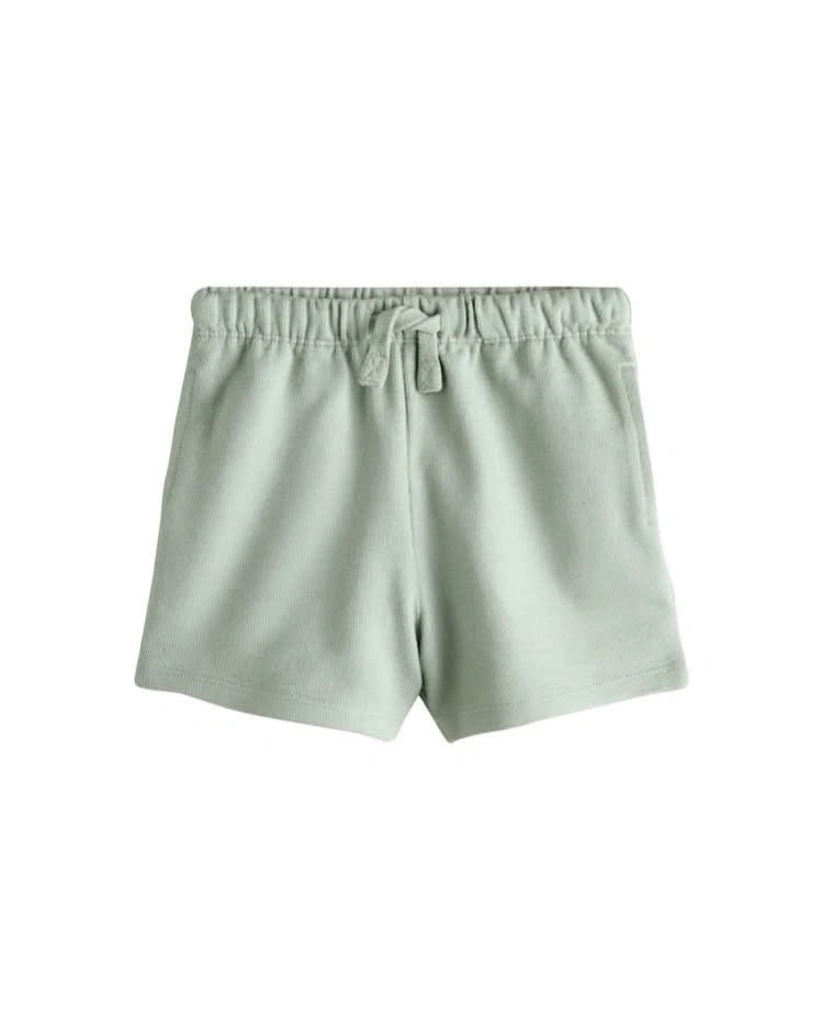 A pair of light sage green drawstring shorts with an elastic waistband, shown flat against a plain white background.