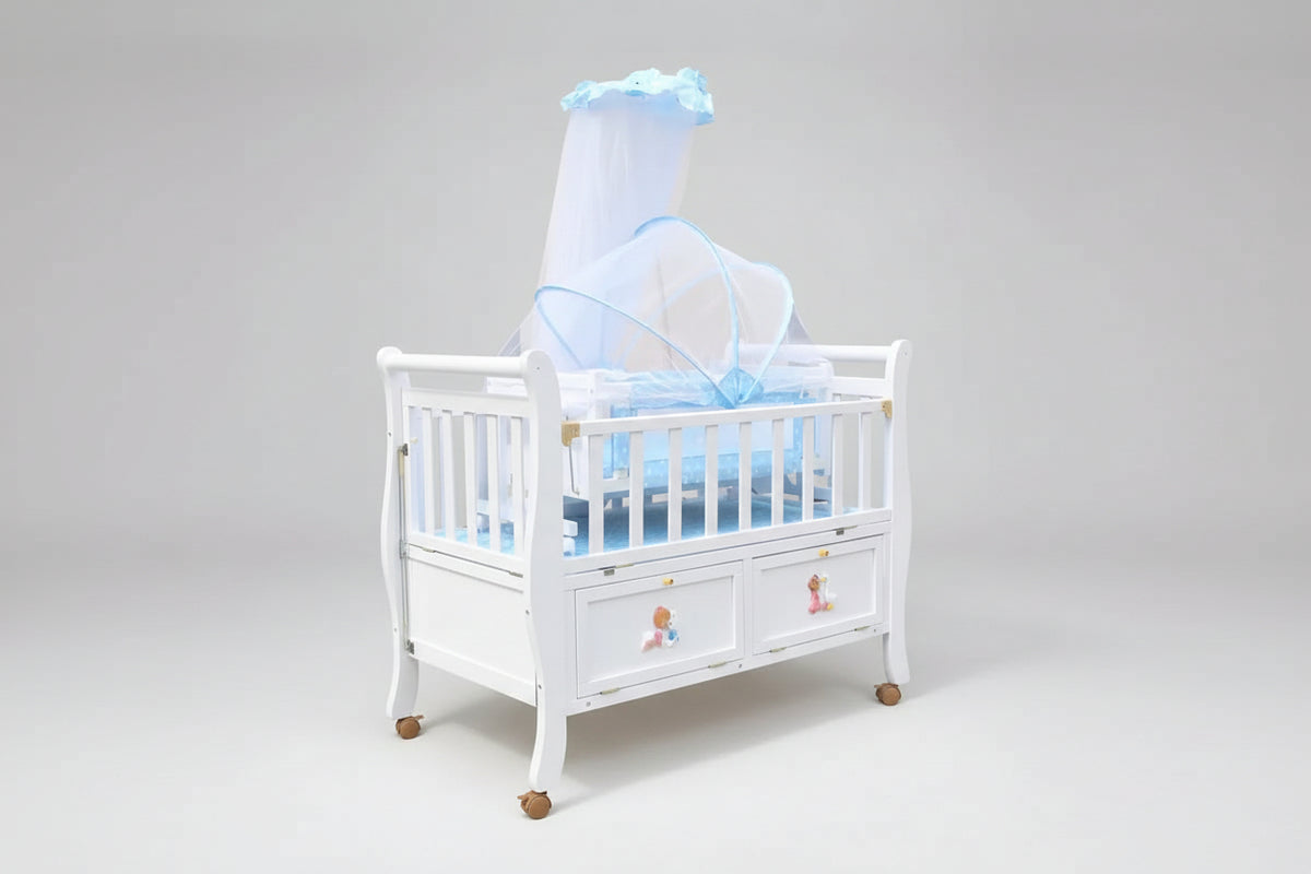 Baby Wooden Cot with a hanging Bassinet Crib with Mosquito Net - Beks Ghana
White crib with blue bedding and a white teddy bear on a gray background