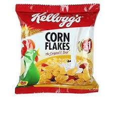 A bag of Kellogg's Corn Flakes cereal, featuring the classic red and white packaging with illustrations of a green apple and yellow corn flakes.